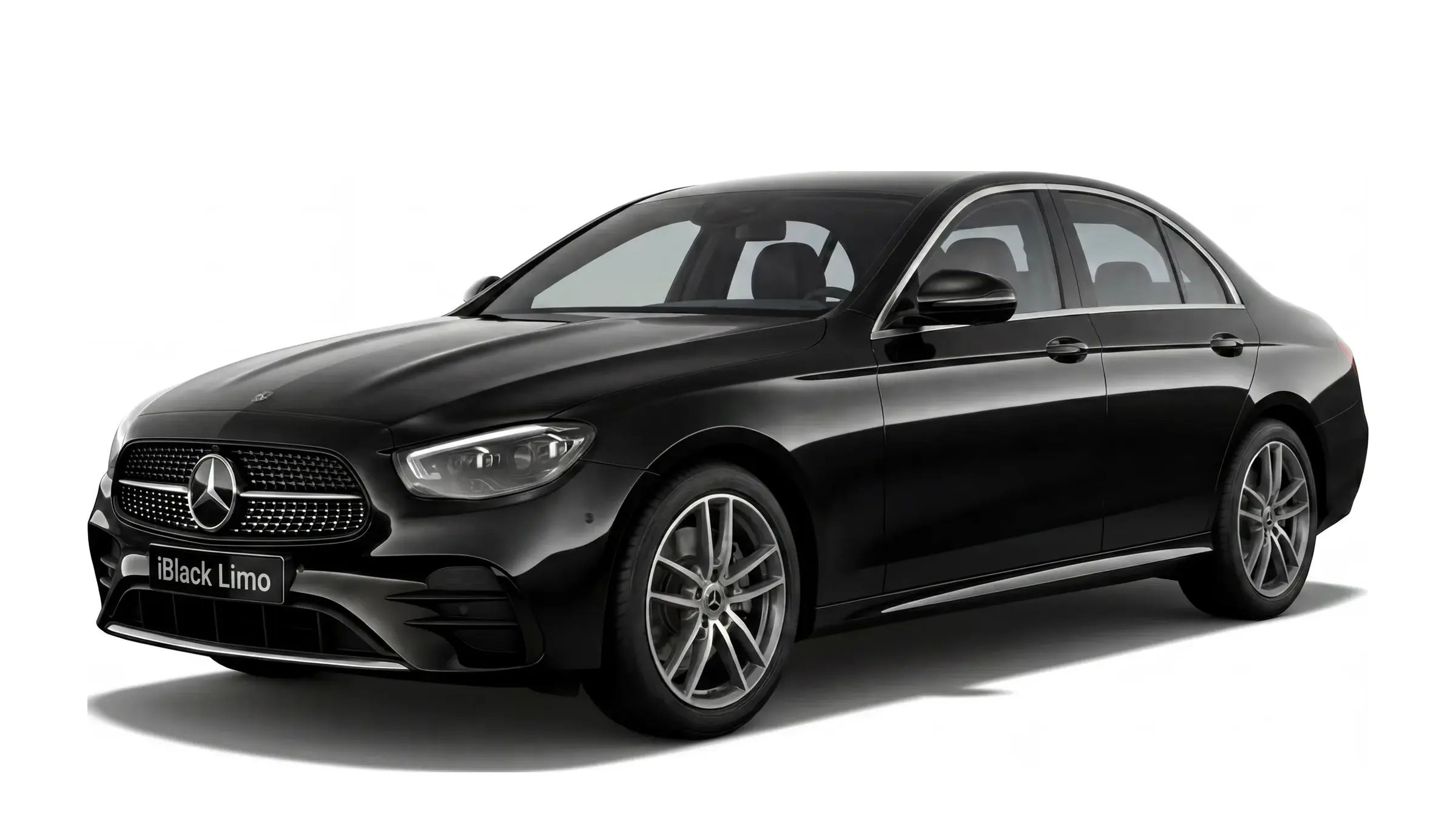 Black Mercedes-Benz E-Class luxury sedan, front three-quarter studio view on white