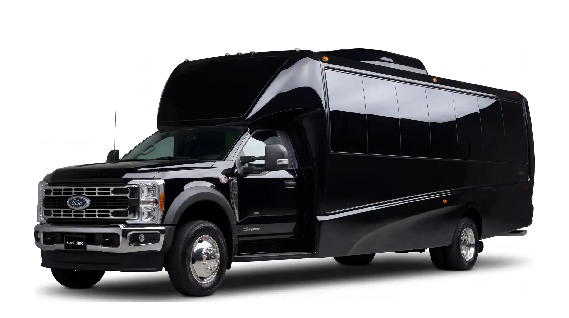 Black luxury mini coach, front three-quarter studio view on white