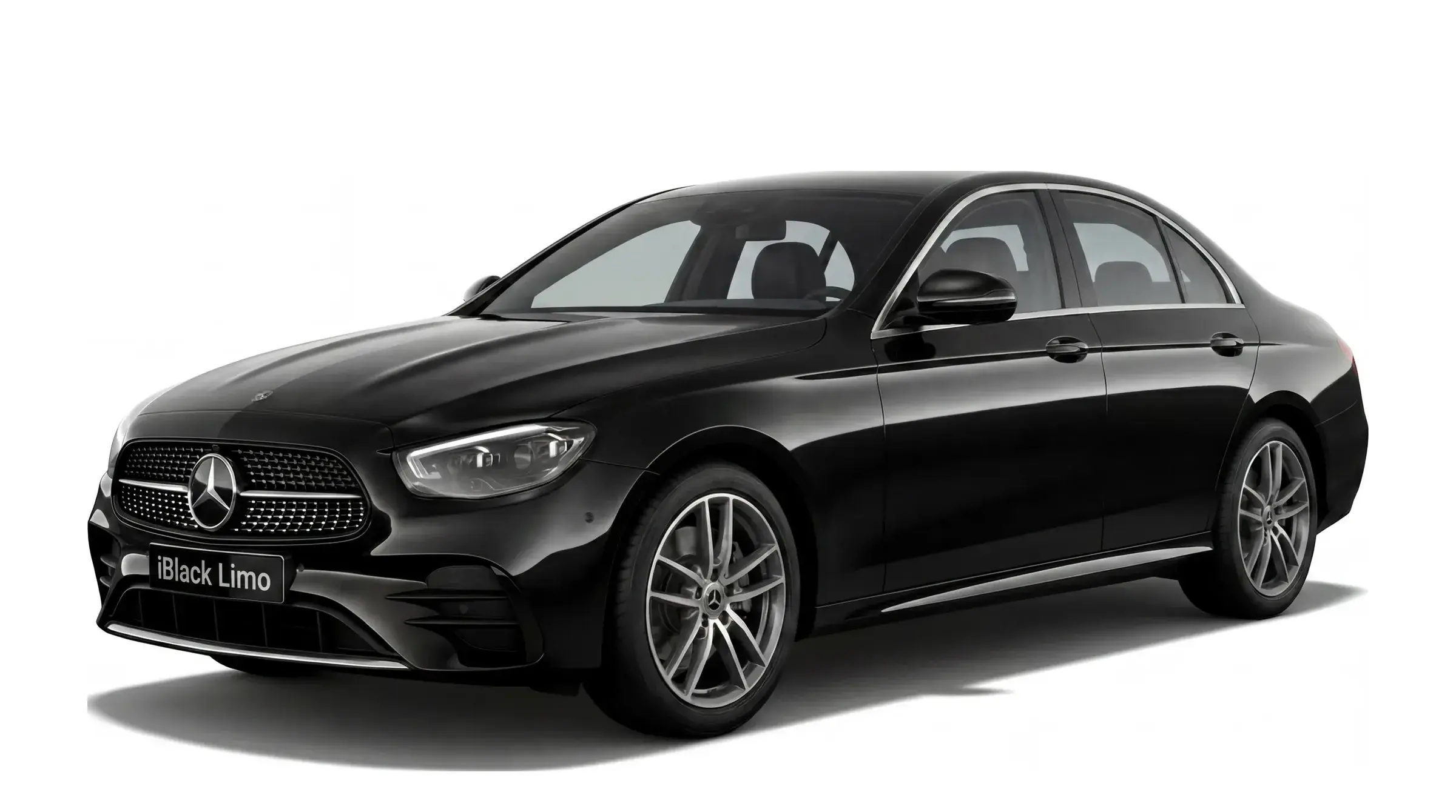 Black Mercedes-Benz E-Class luxury sedan, front three-quarter studio view on white
